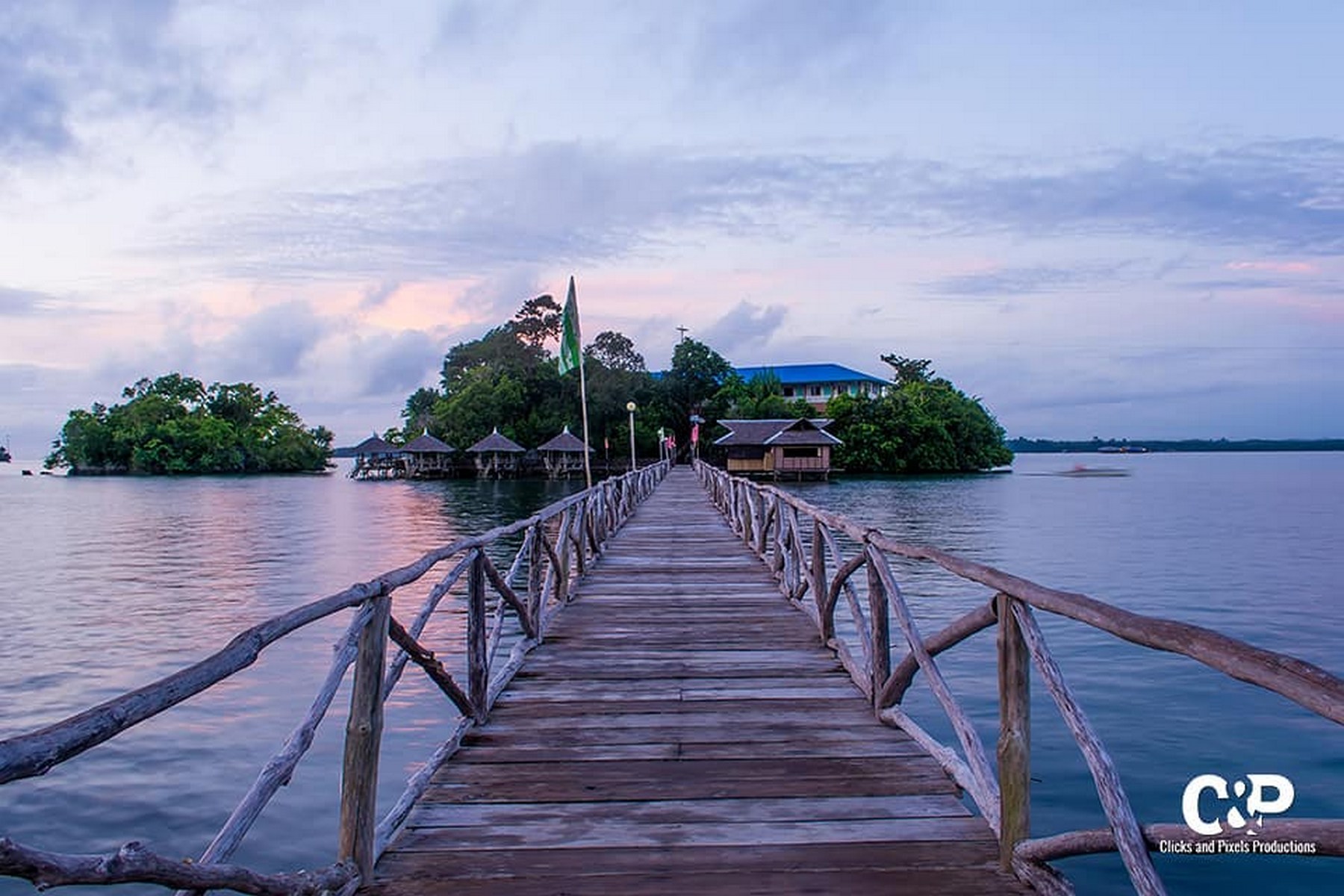 <b class="font-bara"><i class="bi bi-geo-fill h4"></i> ROCK ISLAND RESORT</b> <br/>It offers beach front cottages to enjoy peace and let all your cares drift away. Whether you are looking for a family-oriented vacation or a romantic getaway, you will find this resort right for you. Rooms for accommodation are available.