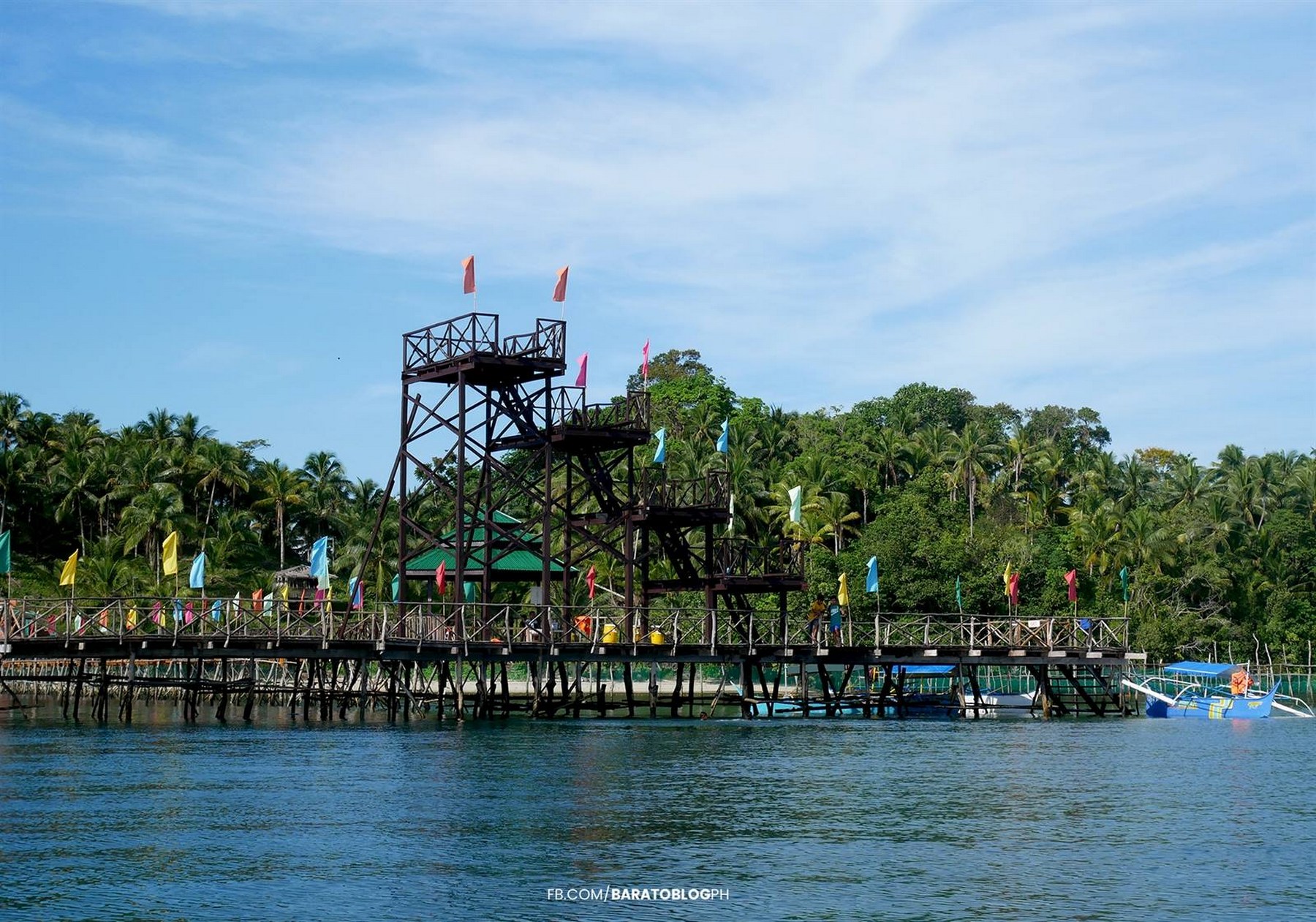<b class="font-bara"><i class="bi bi-geo-fill h4"></i> LODESTONE SHORES RESORT</b> <br/>If you want a little adrenalin rush, Lodestone Shore Resorts is the place to be. You can enjoy swimming or dive in the diving platforms from 5ft to 40ft above sea level. You'll also love the instagrammable boardwalk.