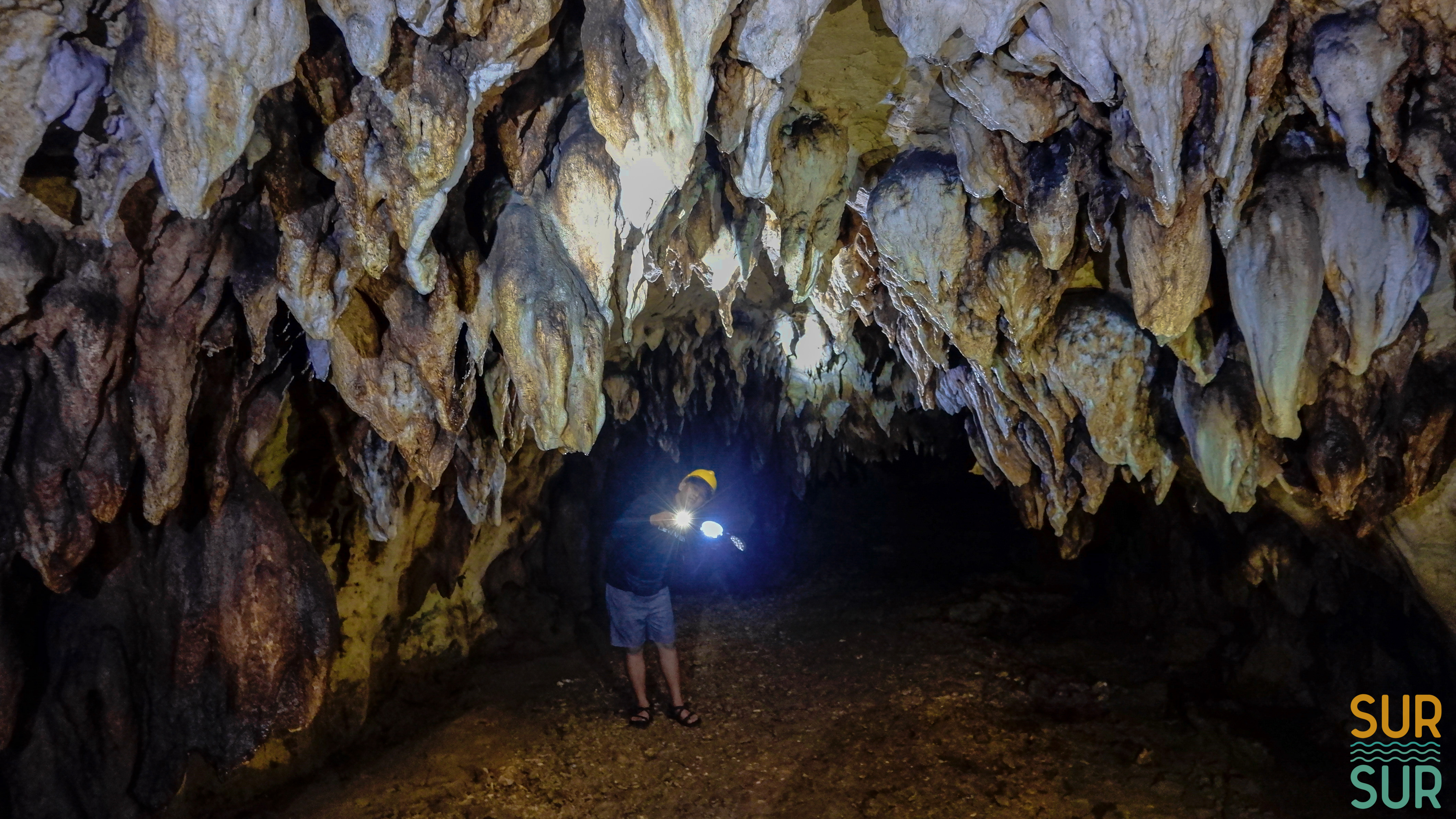 <b class="font-bara"><i class="bi bi-geo-fill h4"></i> POCTO CAVE</b> <br/>Barangay Manyayay, Lianga, Surigao del Sur