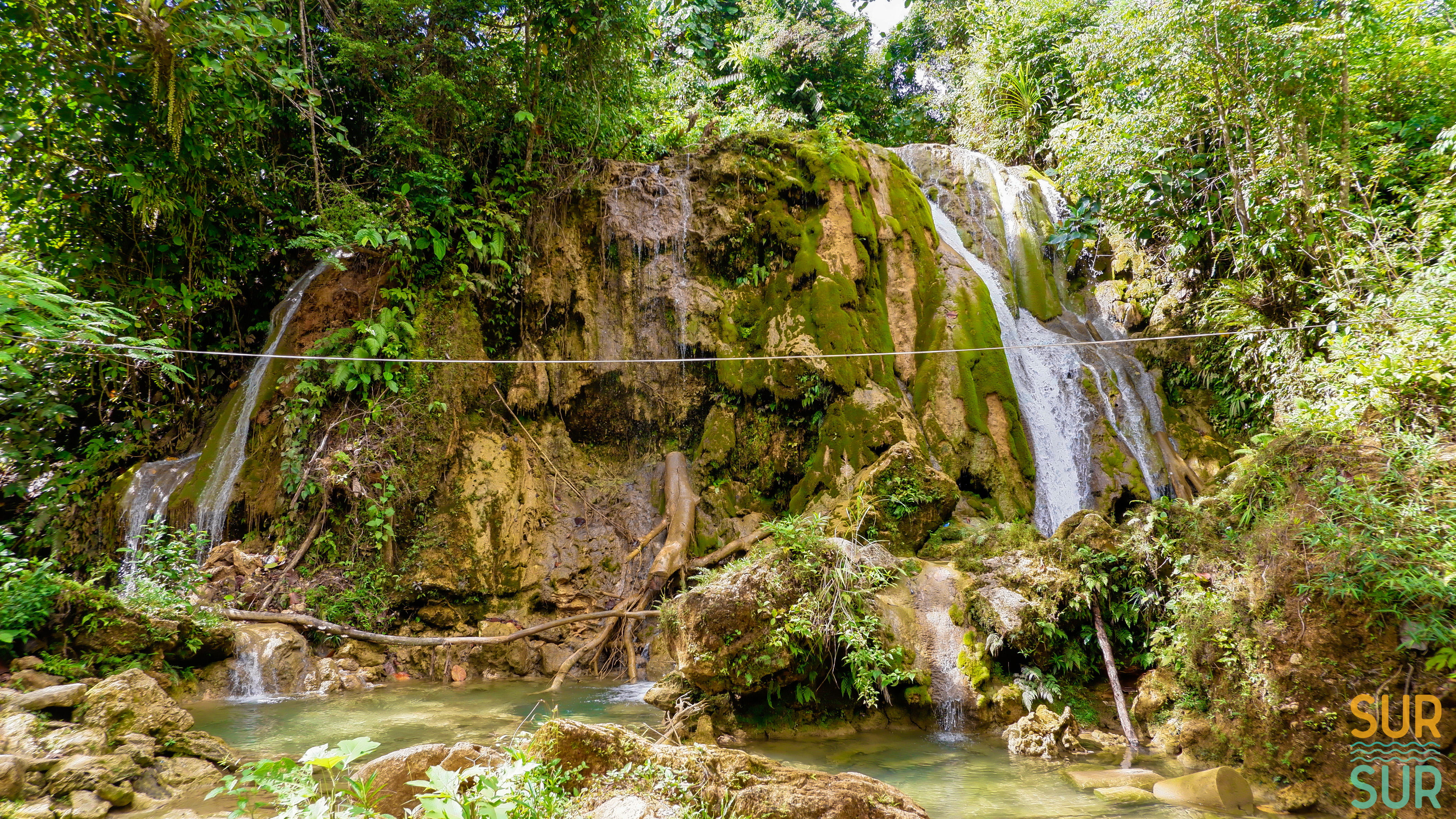 <b class="font-bara"><i class="bi bi-geo-fill h4"></i> LININTIAN FALLS</b> <br/>Sitio Siowao, Barangay Diatagon, Lianga, Surigao del Sur